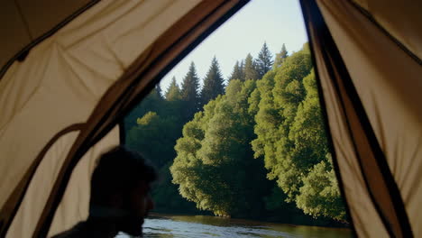 riverside camping: scenic views from a tent