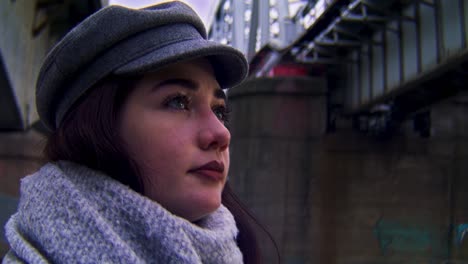 woman under a bridge