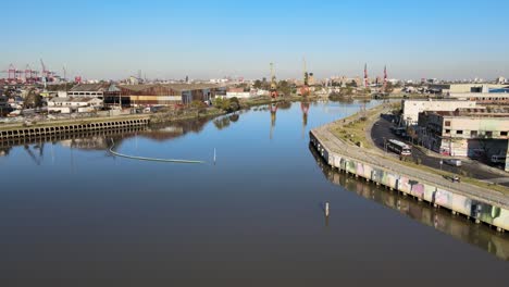 Aerial View Of Matanza River In La Boca, Buenos Aires Province, Argentina With La Boca Port In Distance