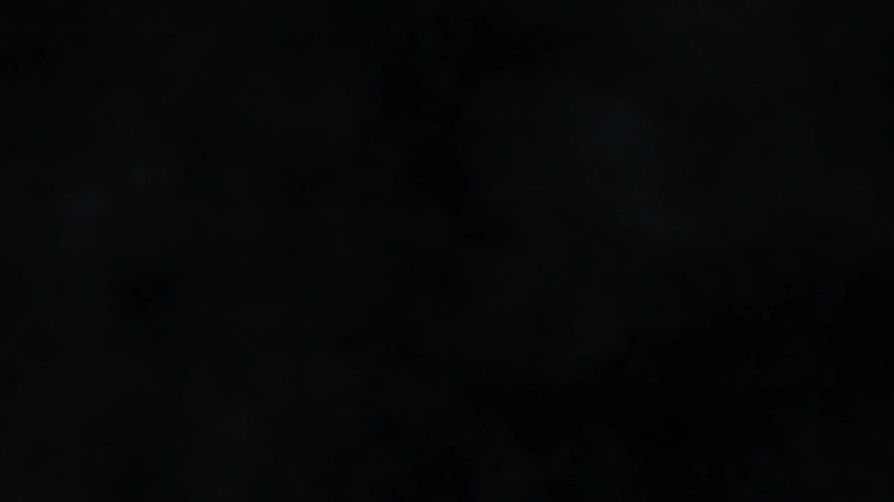 Atmospheric Smoke Fog. Abstract Smoke Cloud. Smoke in Slow Motion on Black Background. Loop