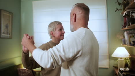 couple dancing at home