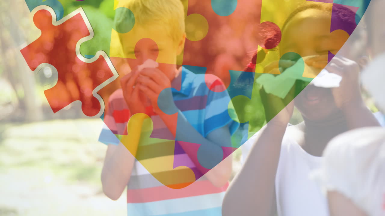 animación de coloridas piezas de rompecabezas corazón sobre niños soplando sus narices