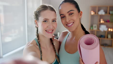 women taking a selfie with a yoga mat