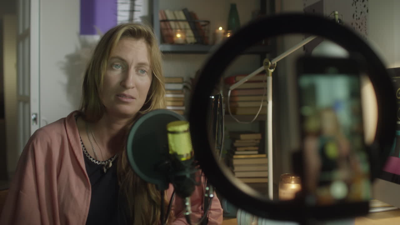 Woman Going Live on Social Media at Home Studio