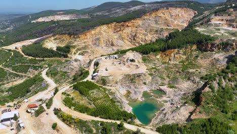 Aerial-shot-of-stone-mine-quarry-and-erosion-on-the-side-of-the-mountain