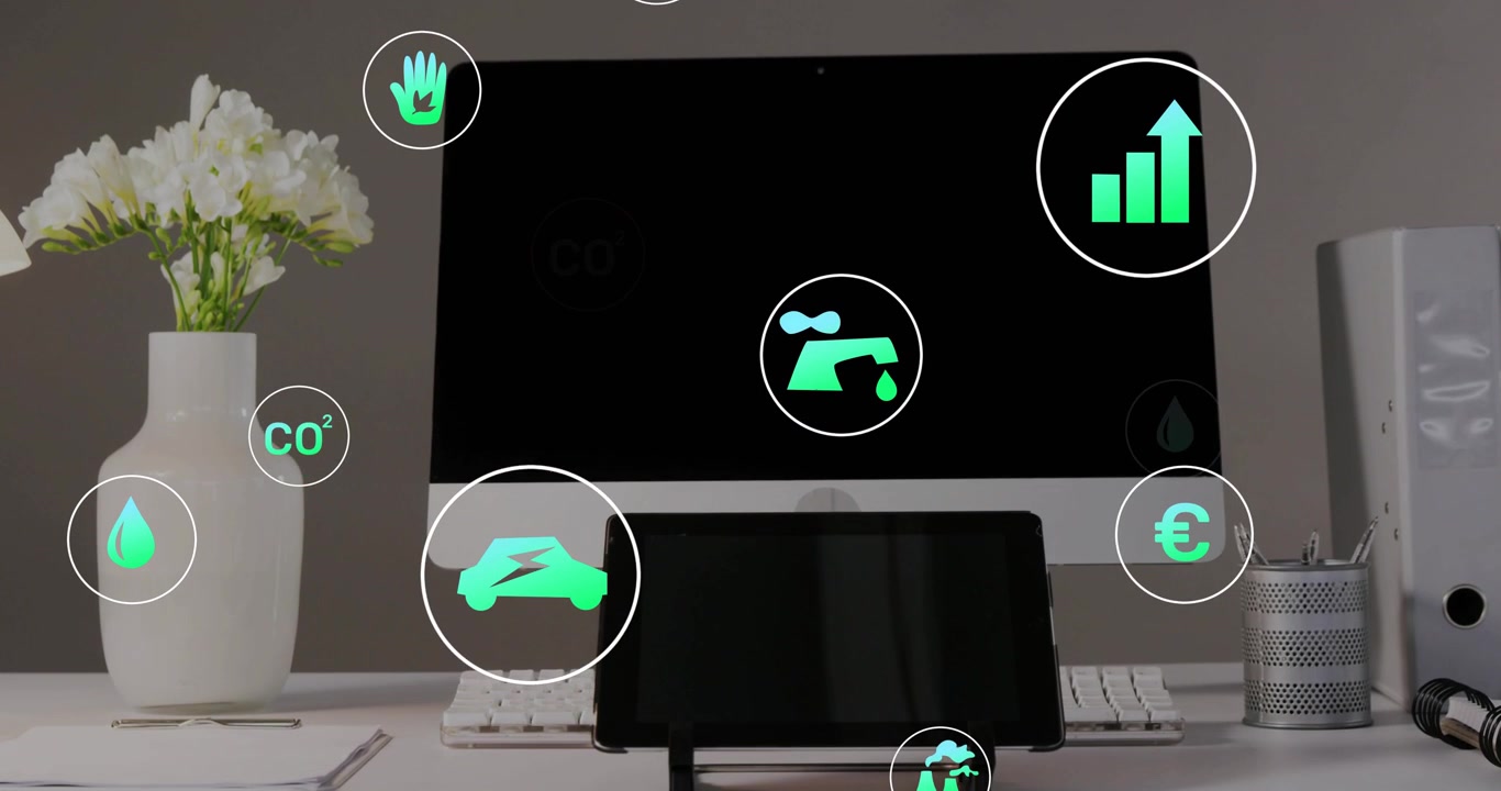 Início do feed de dados, monitor e tablet exibindo ícones de finanças verdes para destacar métricas ecológicas.