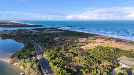 aerial footage of coastline and lush greenery