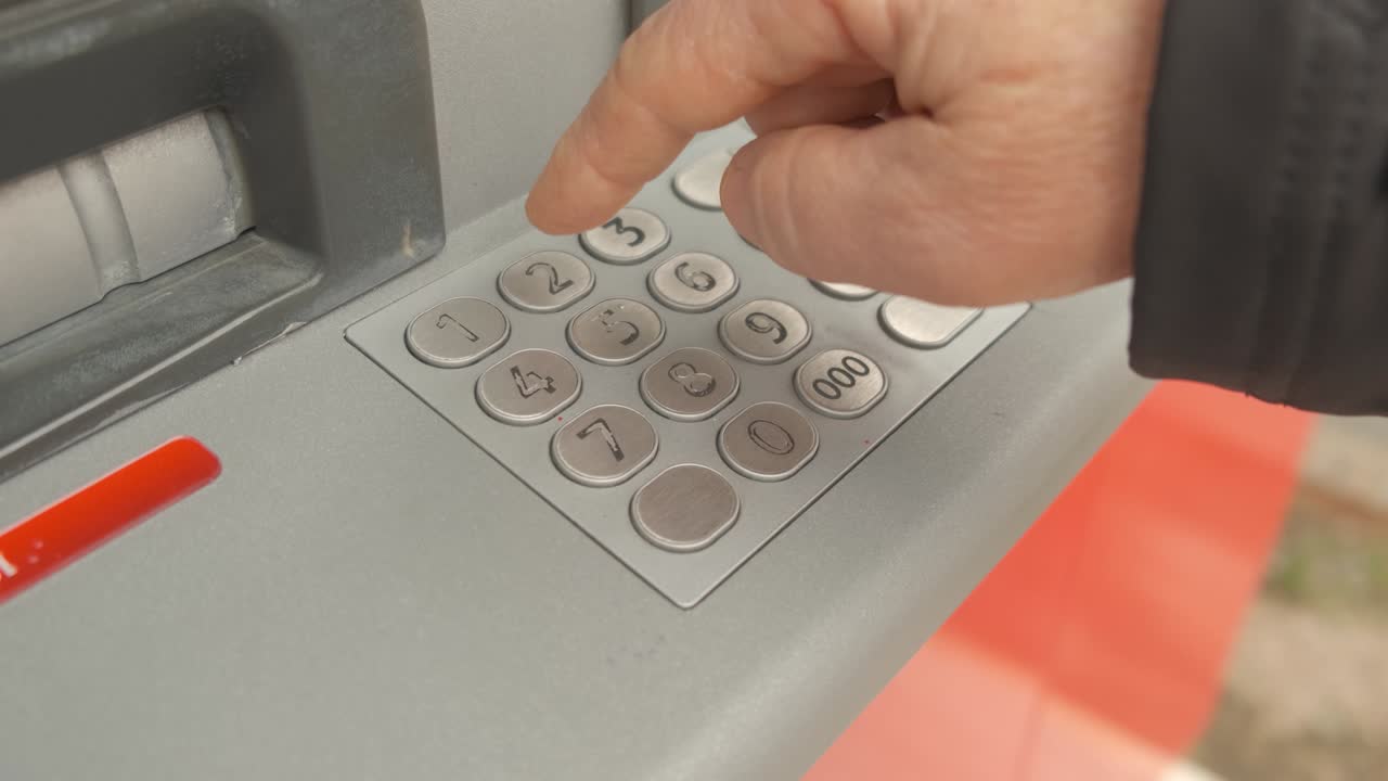 Using street ATM teller machine to manage money.