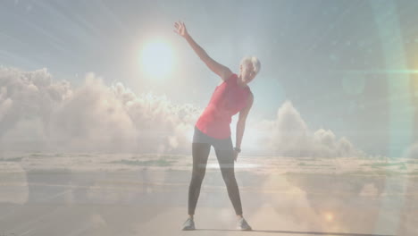 animation of glowing light over portrait of senior woman exercising