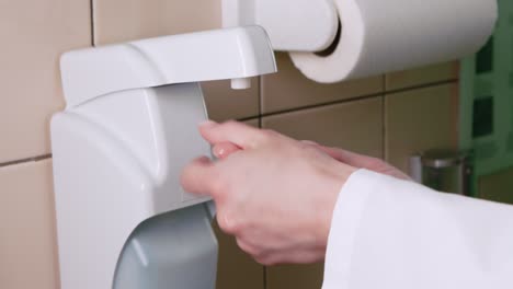 handwashing with automatic sanitizer dispenser