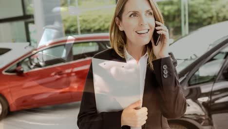 digital animation of female sales executive talking on the phone in car showroom 4k