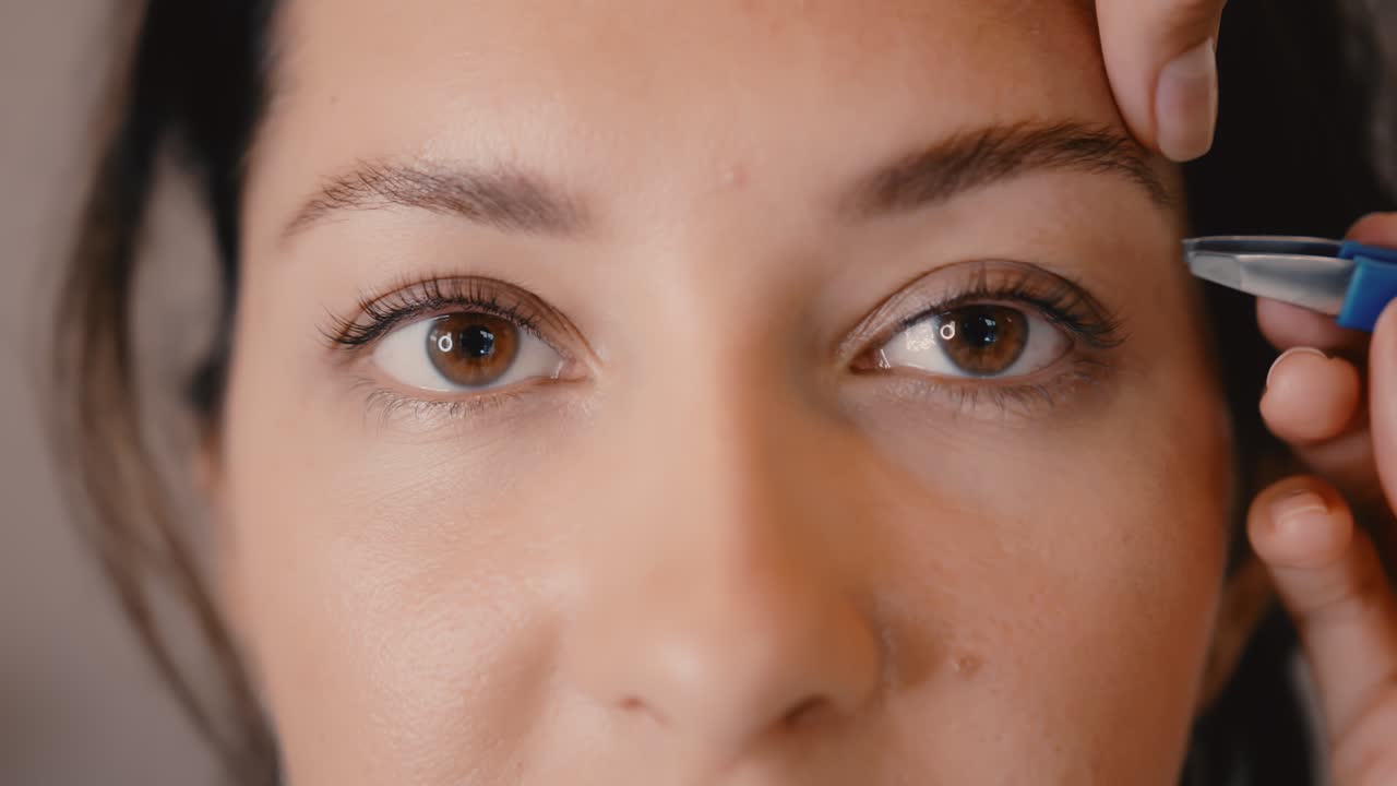 Eyebrow shaping and tweezing