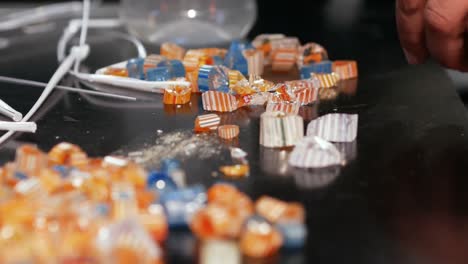 Close-up-of-glass-slices-on-table