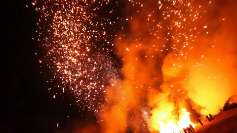fireworks and bonfire display at night