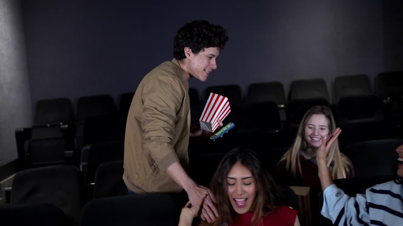 People enjoying a movie at the movie theater