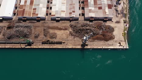 industrial warehouse with heap of metal scrap and waste in ploce, croatia