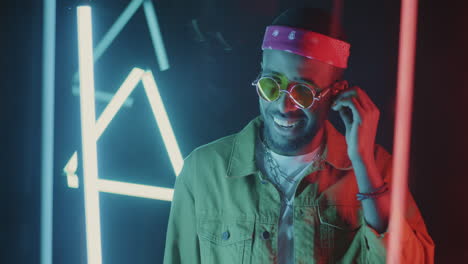 stylish man in neon lights