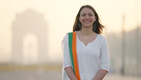 Happy-and-Cheerful-Indian-girl-smiling-near-India-gate-Delhi