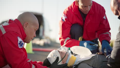 hands, medical and emergency with a paramedic team