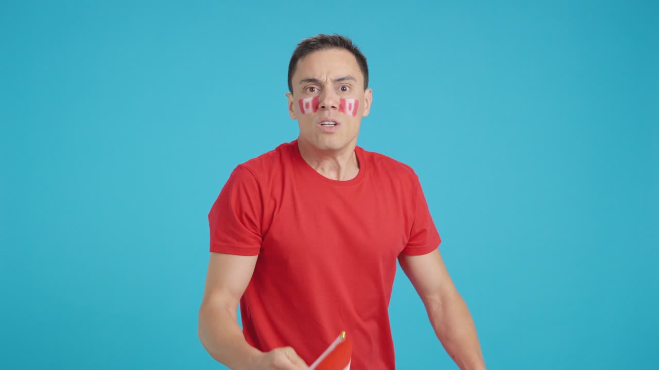 Man Cheering for Canada, angry with the decision of referee