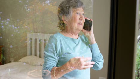 Senior-woman-talking-on-mobile-phone-4k