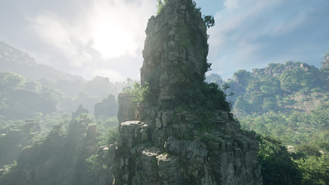 안개가 가득한 산 계곡의 웅장한 절벽 풍경