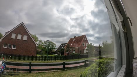 time lapse by the window with the clouds passing and the sun moving