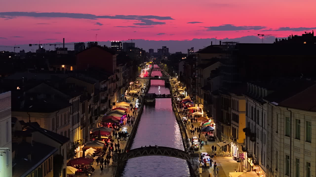 Aerial drone view of the Naviglio Grande canal at sunset
