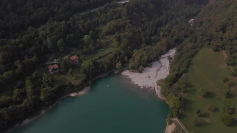 aerial overview of tenno lake, trentino, italy. 4k