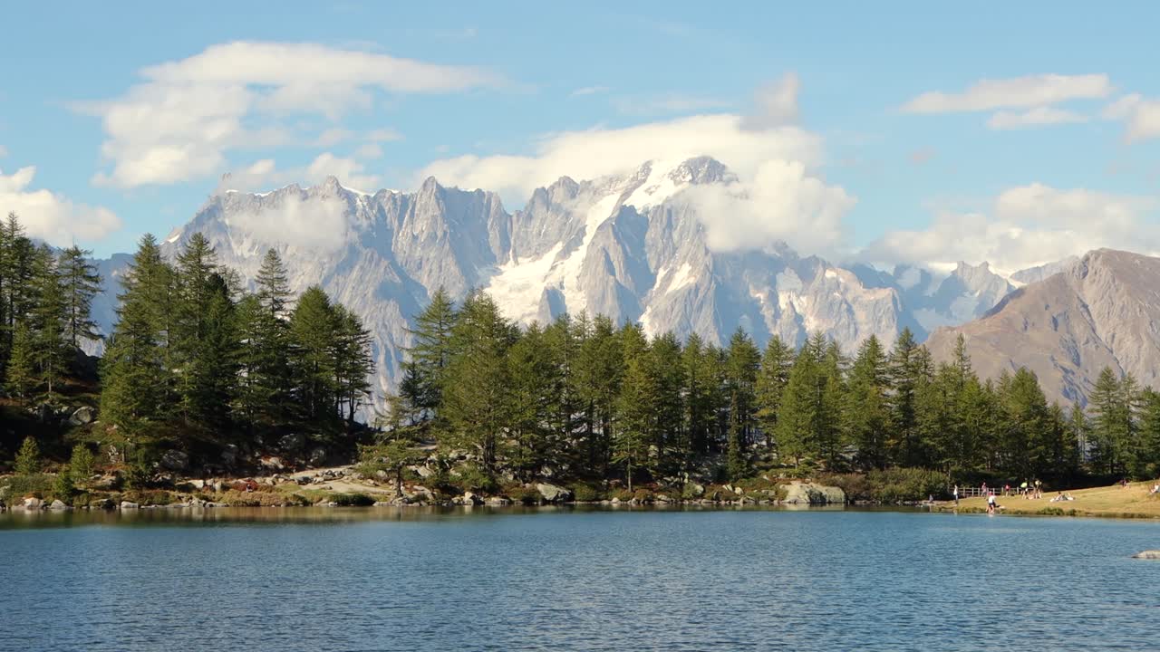 There are stories told in the cold of the mountains, in places where greatness confronts smallness and man feels infinite in the snow of the cold, snowy Alps and the lake is out of this world