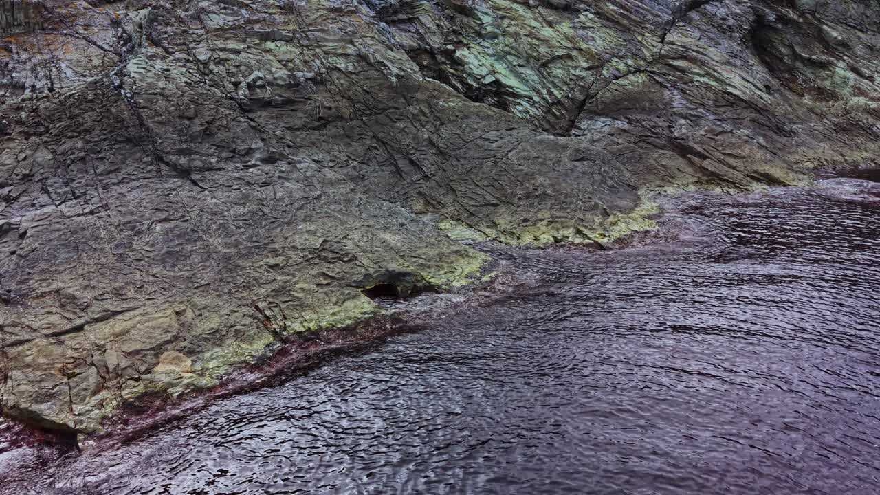 Stunning aerial view of rugged rock formations along the coastline