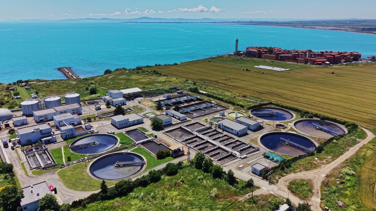 Water treatment facility near the ocean on a sunny day