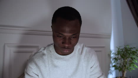 closeup of young man on bed