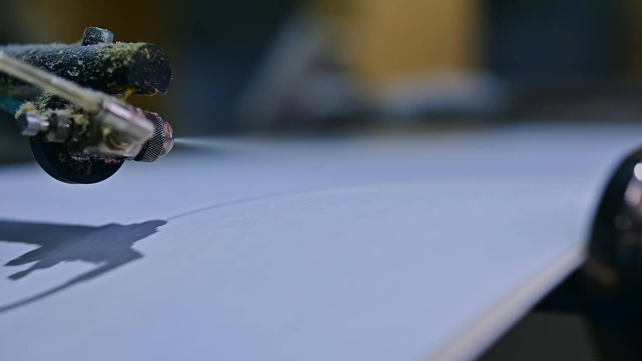 Close up view of modern technologies for making diapers. Pampers production mechanism motion.