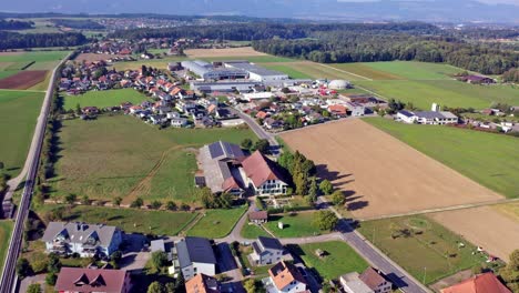 drone flight over the rare industry of bätterkinden at the gateway to emmental