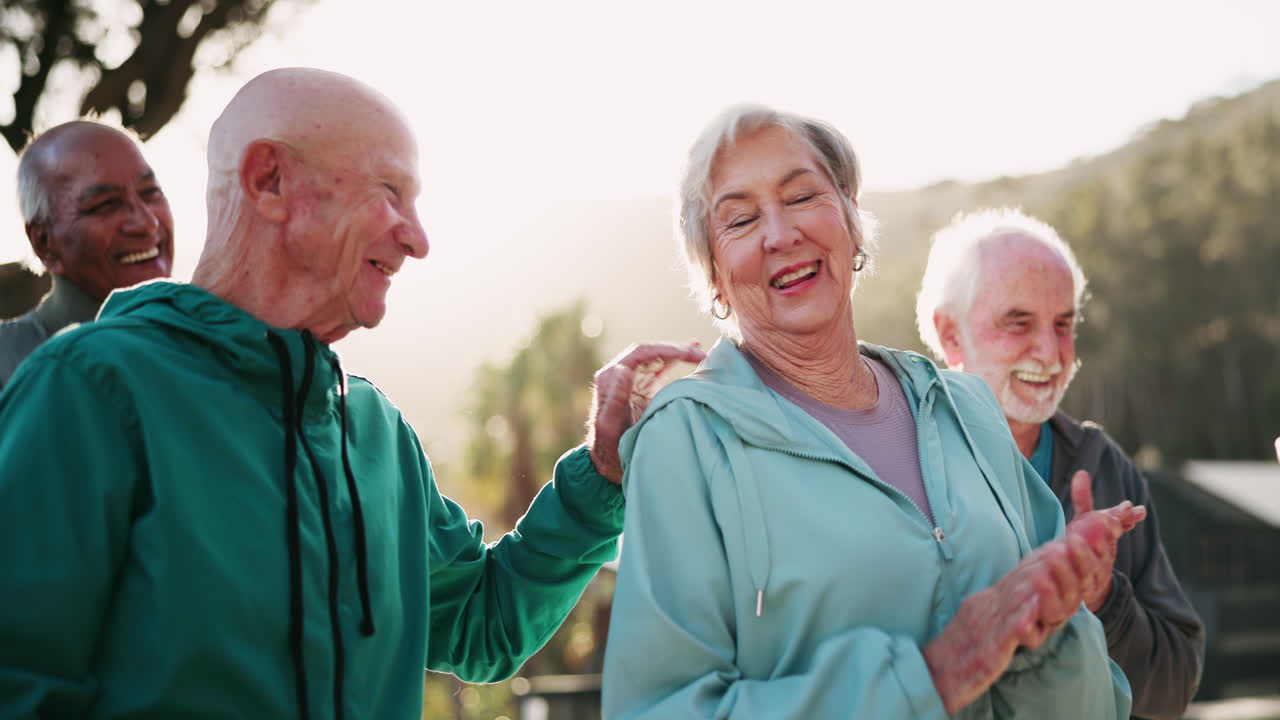 Group of Happy Senior Citizens Exercising Outdoors