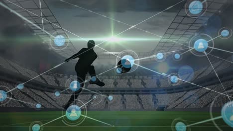 Animation-Von-Verbindungen-über-Der-Silhouette-Eines-Männlichen-Fußballspielers-Im-Stadion