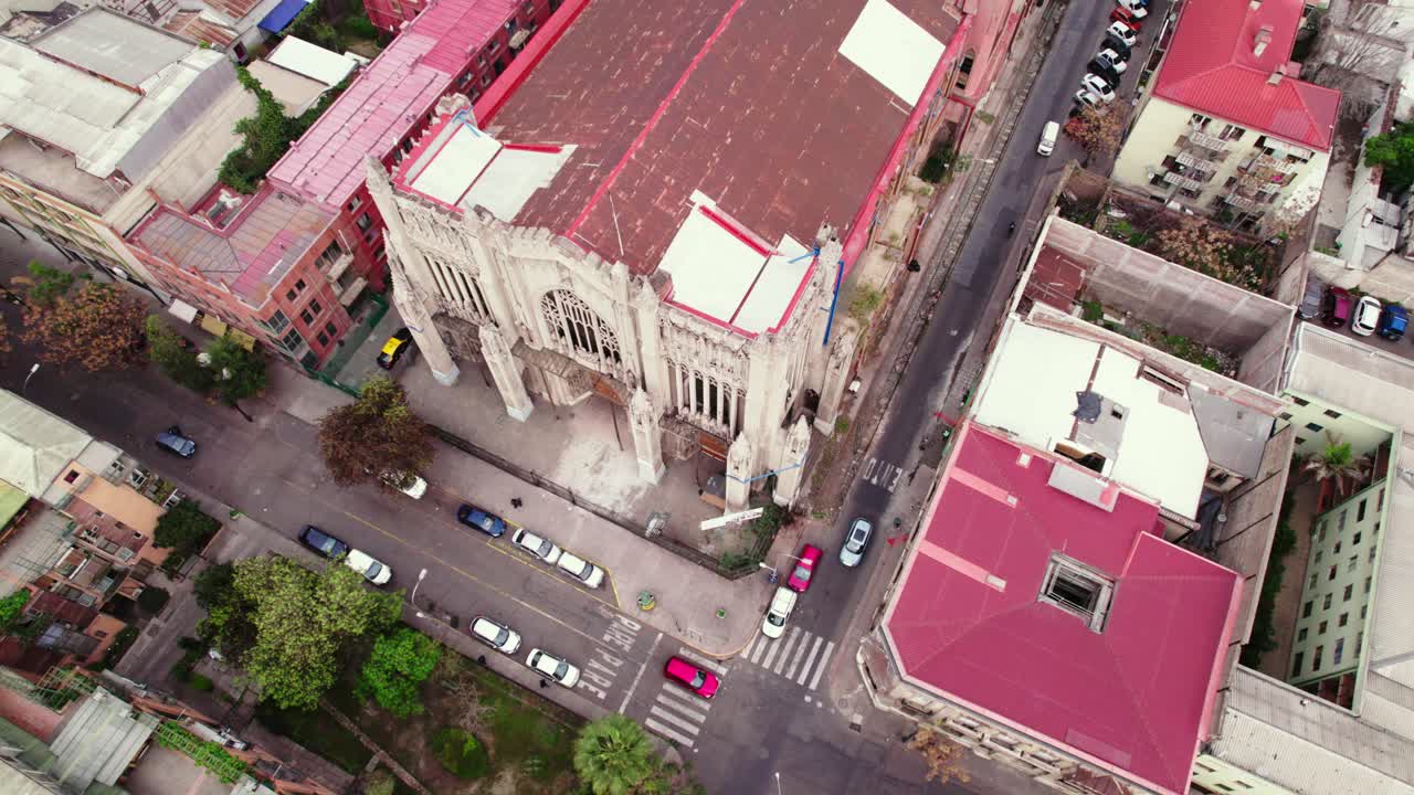 Aerial orbit establishing the Gotic style Savior's Basilica in downtown Santiago Chile
