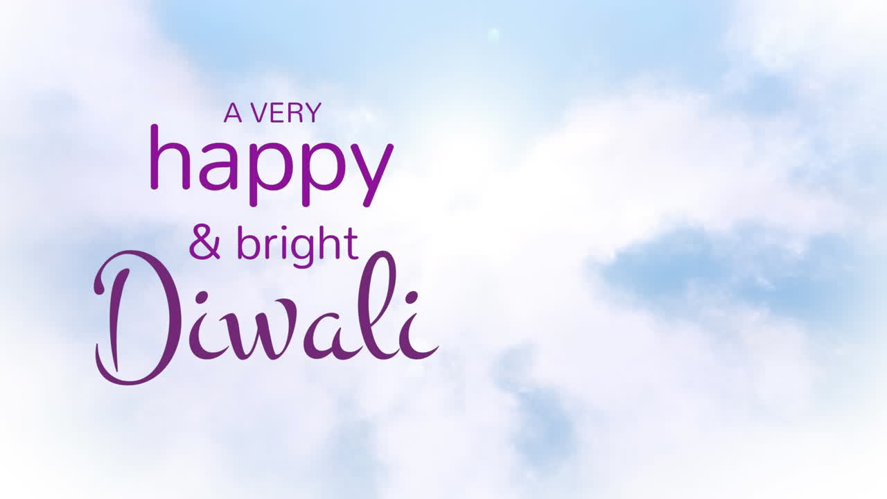 青い空と雲の上でディワリの祝福のテキストのアニメーション