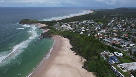 beachfront hotels at cabarita beach and surf lifesaving club building in bogangar, nsw, australia