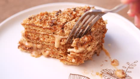 slice of nut cake with fork