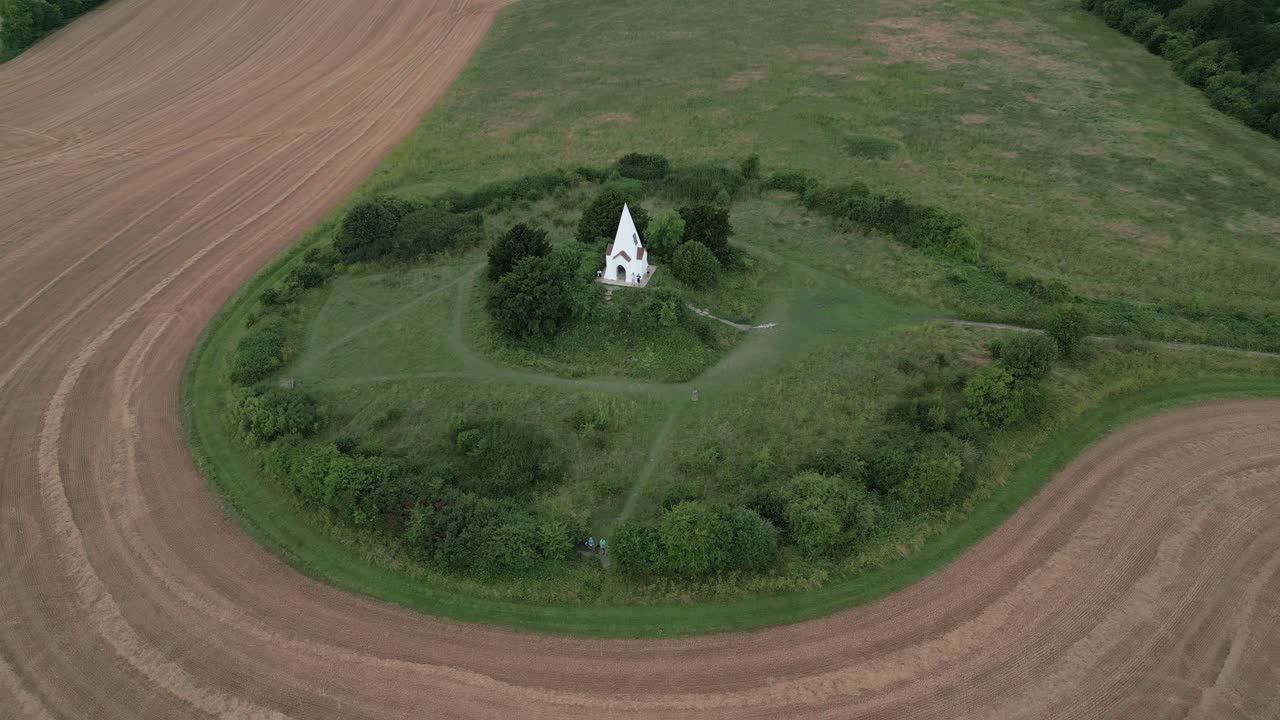 Aerial view establishing Farley mount monument horse burial marker on Hampshire country park hill