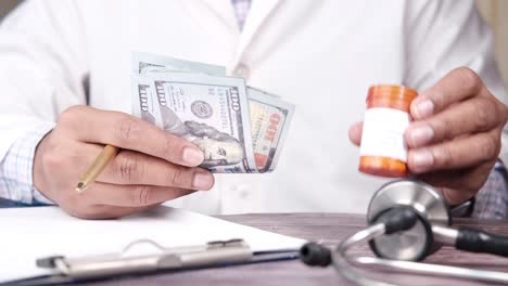 doctor receiving payment for medical services