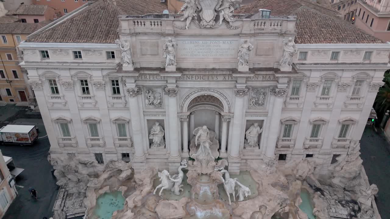 Tilt Down Aerial Shot Of The Trevi Fountain In Rome, Italy. Famous Roman Tourist Attraction.