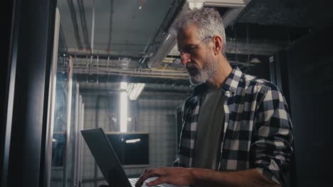 it technician working in a server room