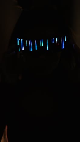 woman wearing futuristic led glasses