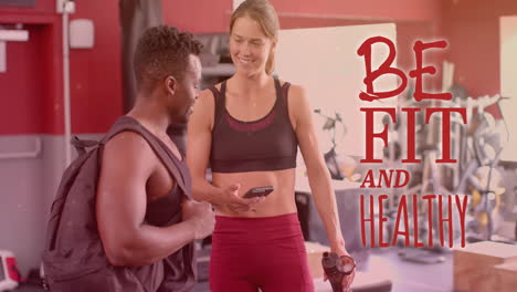 animation of be fit and healthy text over diverse man and woman exercising in gym