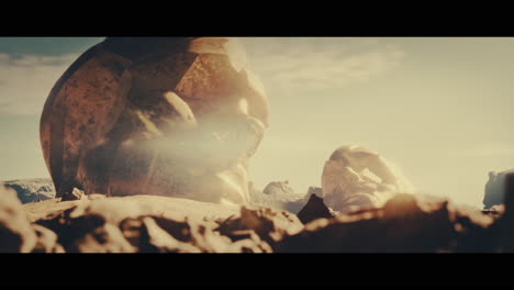huge golden statues in the desert during sunset