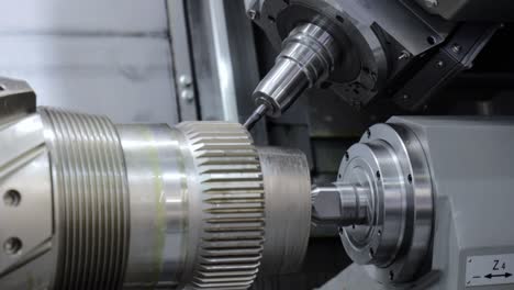 Metalworking-CNC-lathe-milling-machine.-Cutting-metal-modern-processing-technology.