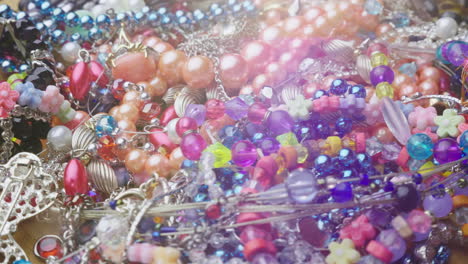 Many-Different-Female-Jewelry-Colored-Beads-And-Bracelets-4K-Video